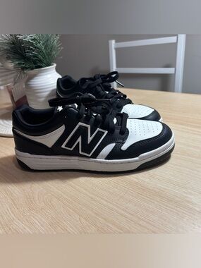 New Balance Kids Black and White Low-Top Sneakers